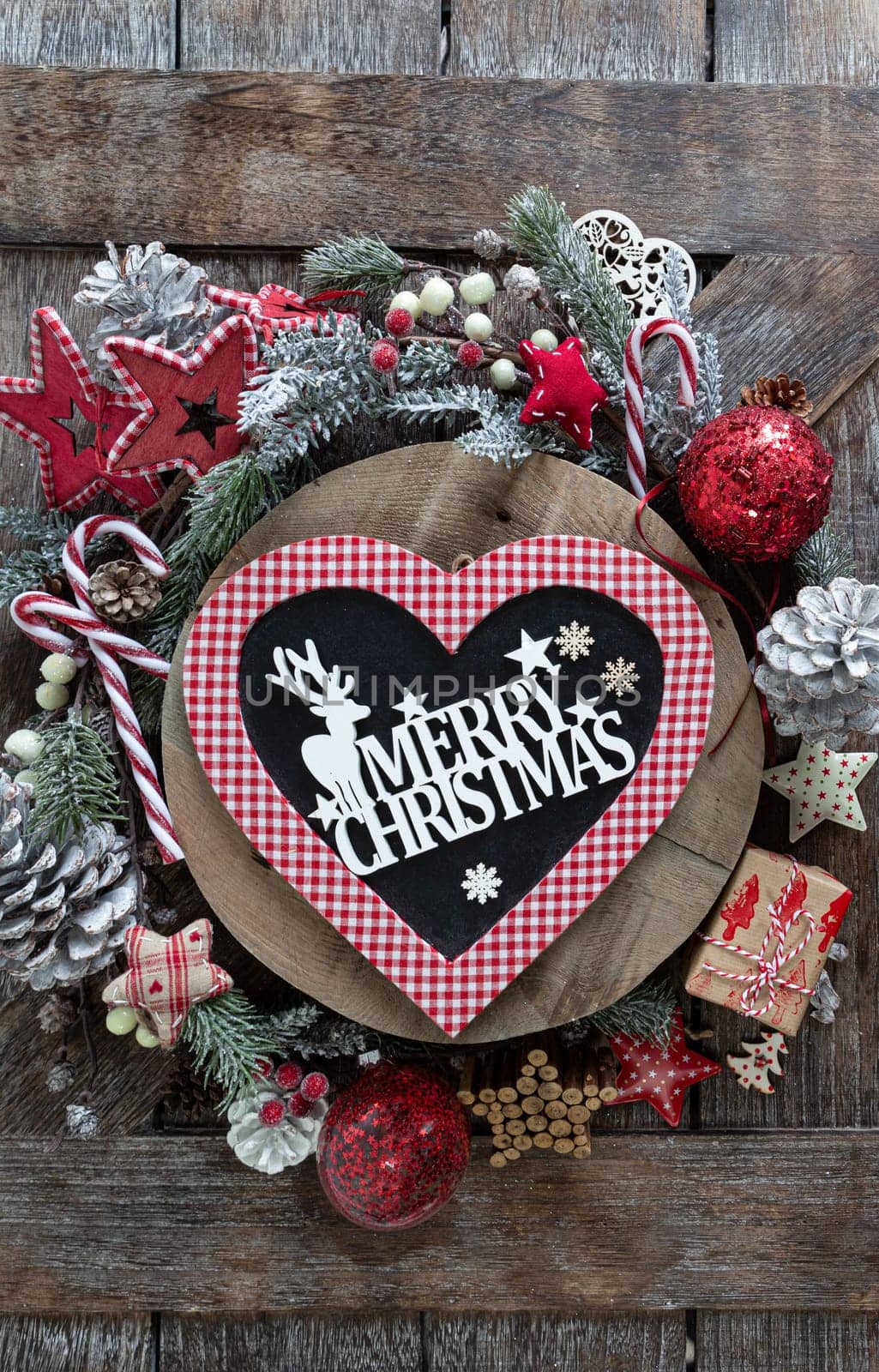 Festive decorations for a cheerful Christmas season on a wooden background