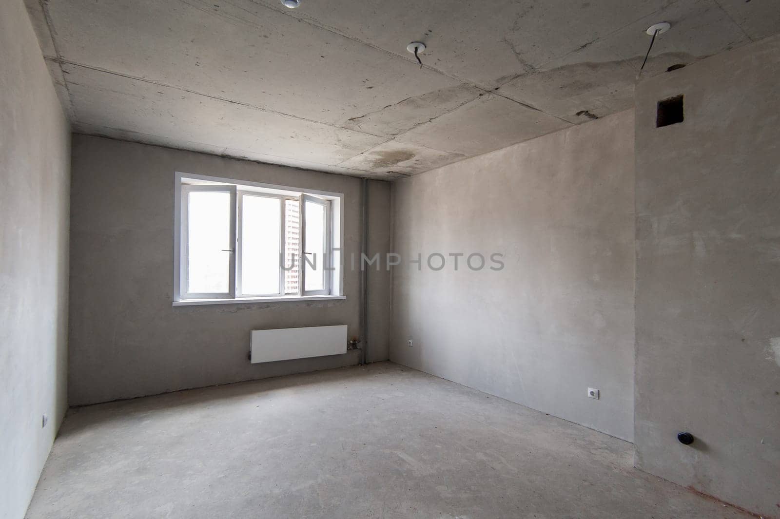 Russia, Moscow- May 16, 2019: interior room apartment. standard repair decoration in hostel. self-finish rough repair