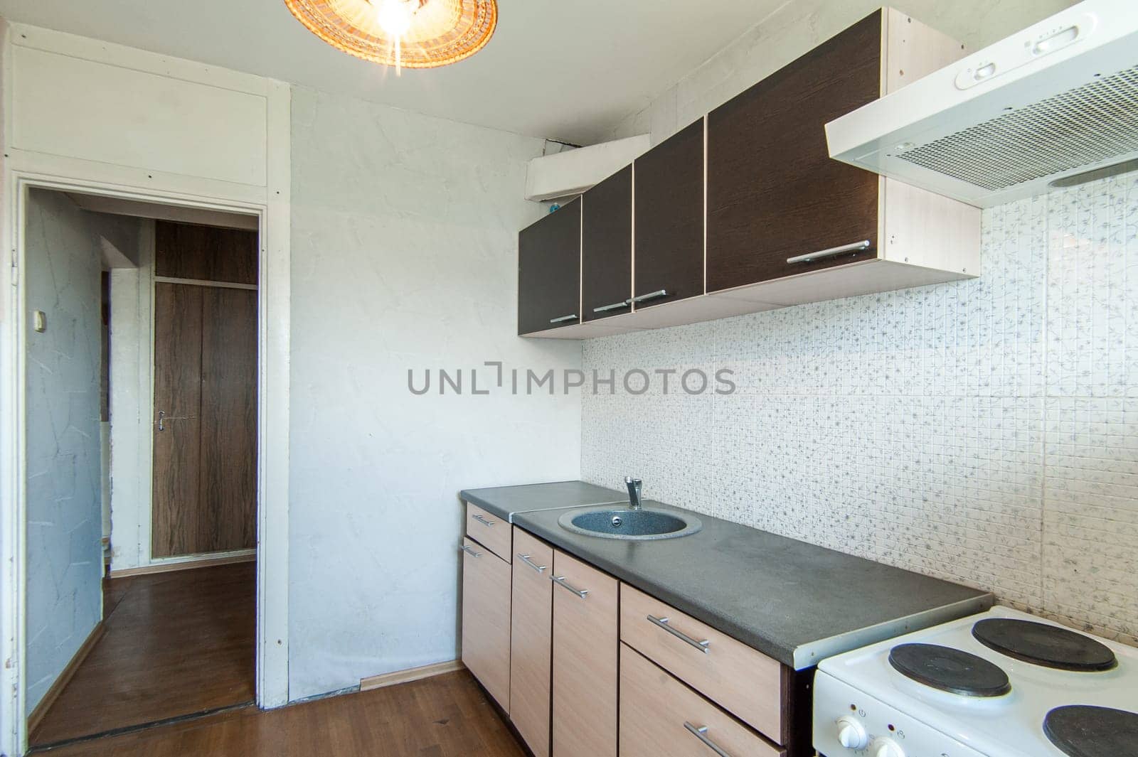 Russia, Moscow- May 16, 2019: interior room apartment. standard repair decoration in hostel. kitchen and dining room