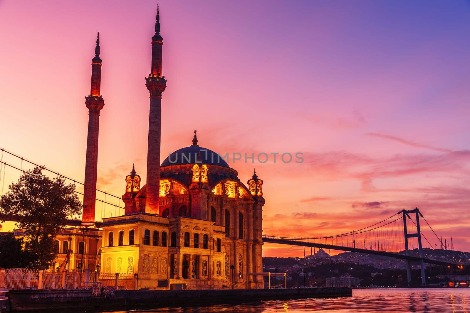 Ortakoy Mosque at purple sunrise, Istanbul, Turkey.