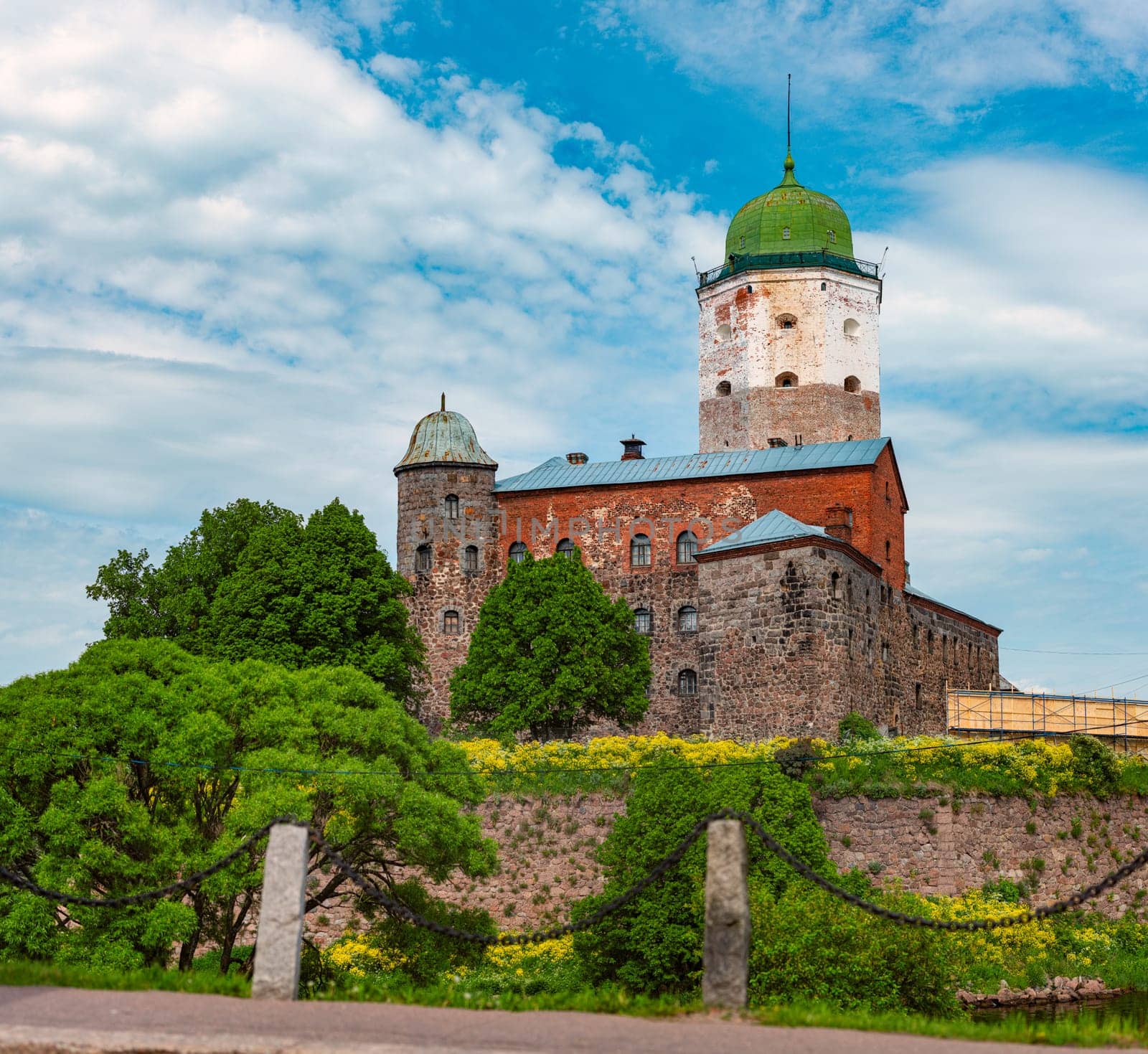 Architecture of old town Vyborg, Russia, Europe. Saint Olaf tower and Vyborg castle on summer day.