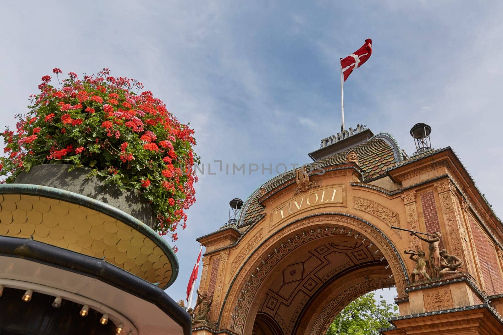 COPENHAGEN, DENMARK - JUNE 28, 2017: The main entrance gate into Tivoli amusement park in Copenhagen, Denmark.