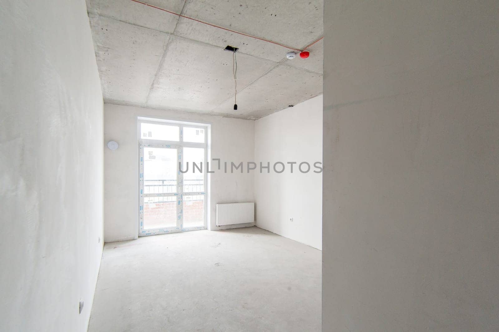 Russia, Moscow- May 17, 2019: interior room apartment. standard repair decoration in hostel. self-finish rough repair