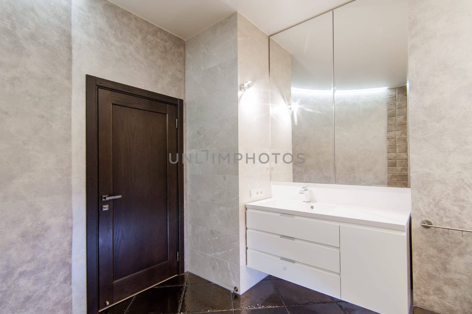 Russia, Moscow- May 20, 2019: interior room apartment. standard repair decoration in hostel. modern bathroom, sink, decoration elements, toilet.