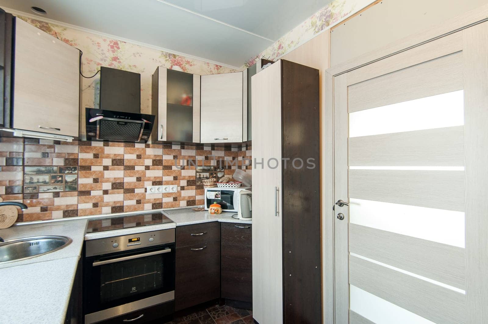 Russia, Moscow- May 20, 2019: interior room apartment. standard repair decoration in hostel. kitchen and dining room