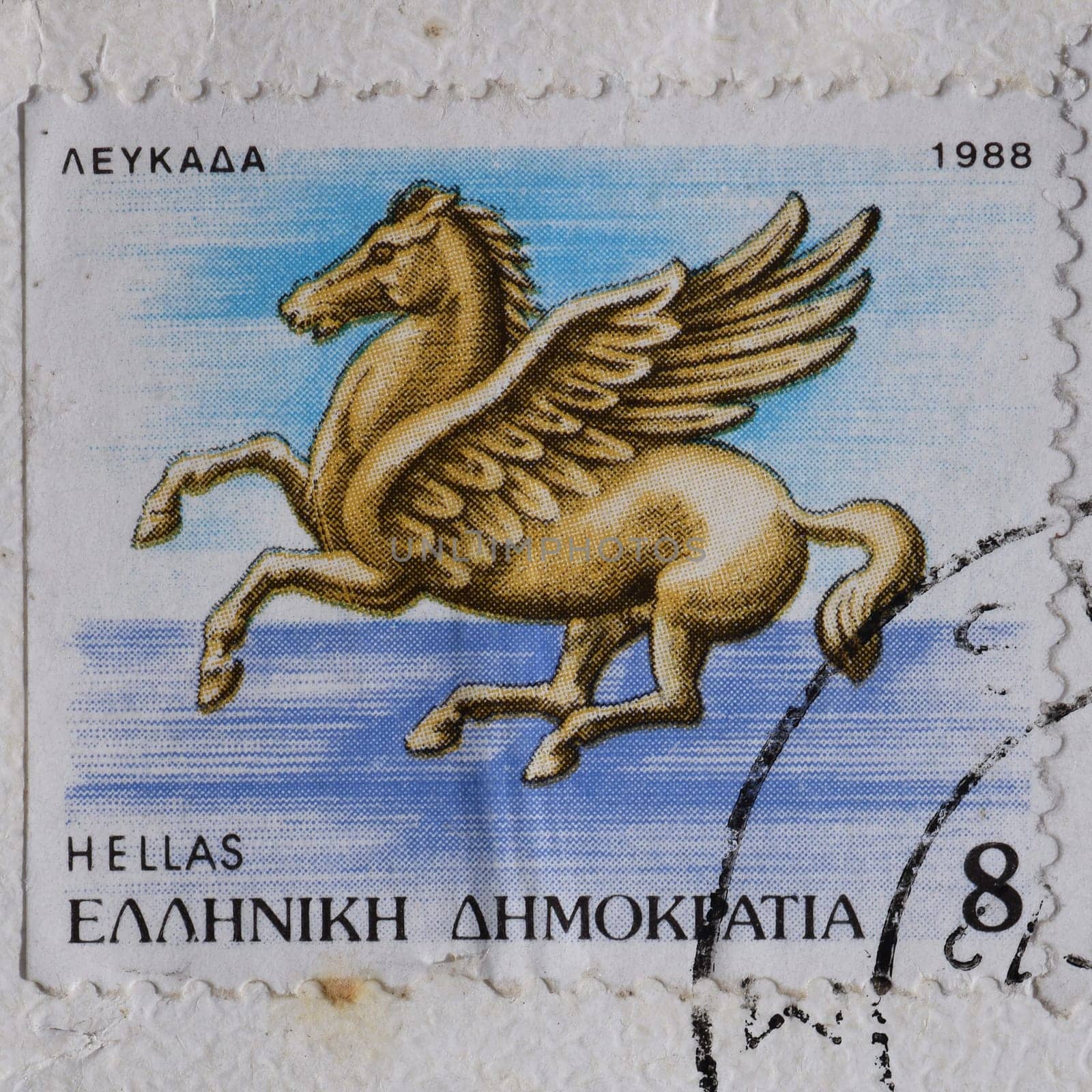 GREECE - CIRCA 1988: Pegasus flying horse greek mythology winged creature illustration on vintage postage stamp printed and postmarked by the Hellenic Post.