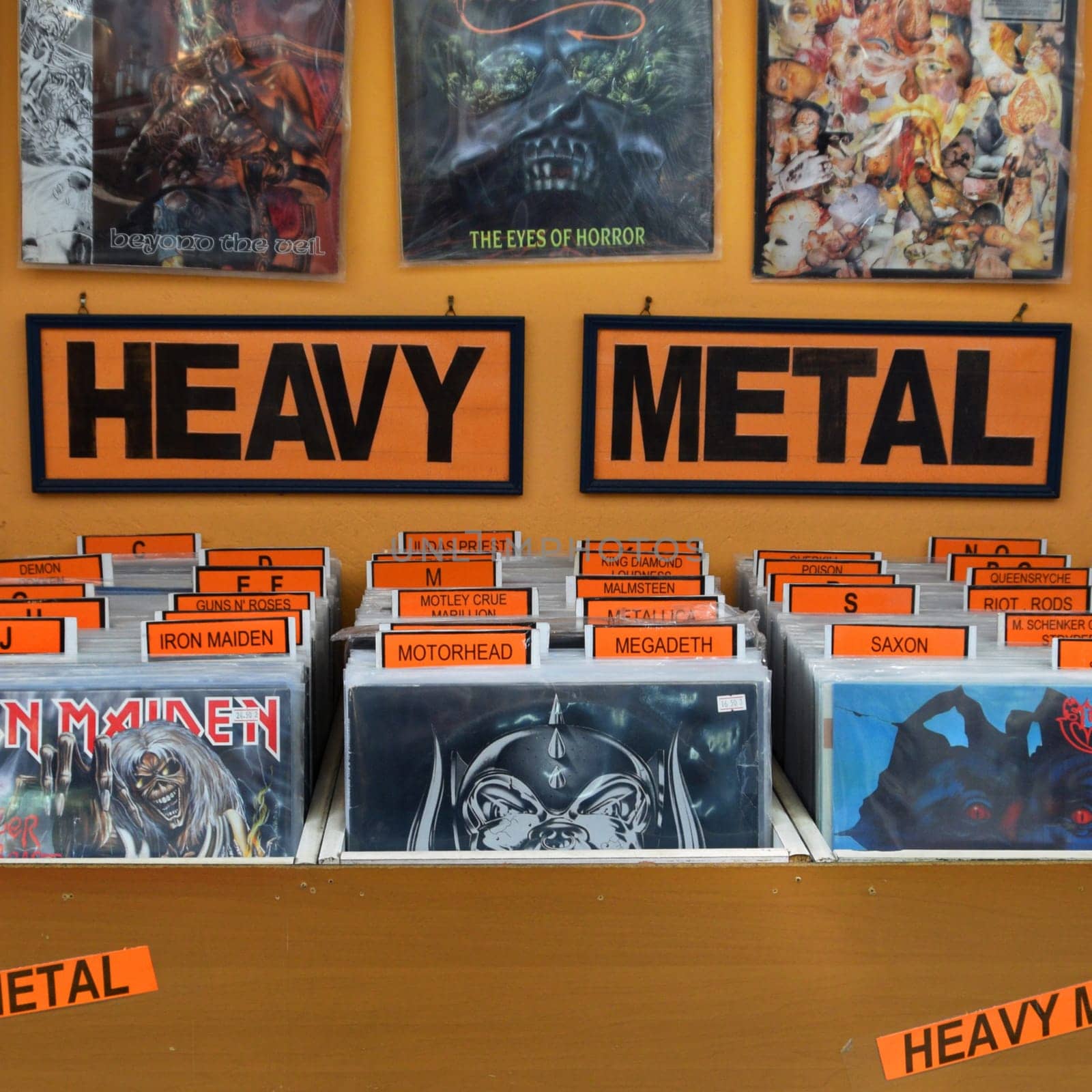 ATHENS, GREECE - APRIL 27, 2015: Heavy metal rock music vinyl records from the 1980s organized alphabetically and by popular bands.