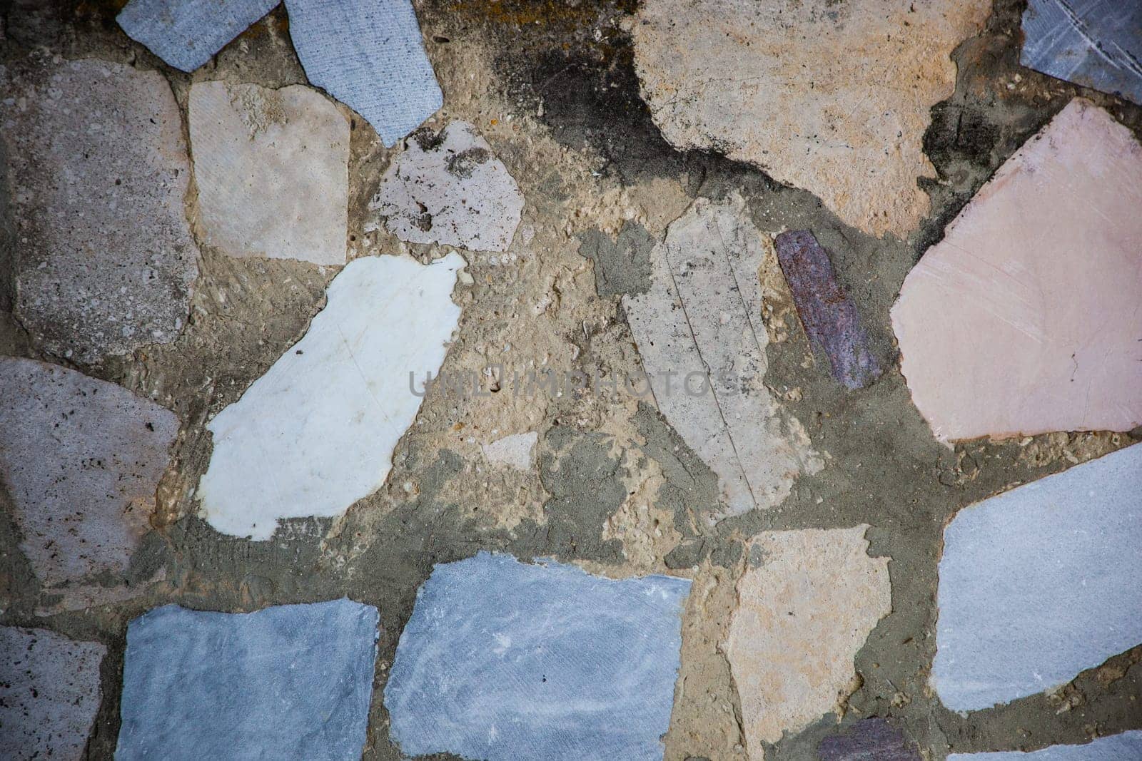 Texture of a stone wall. Old castle stone wall texture background. Stone wall as a background or texture. Part of a stone wall, for background or texture