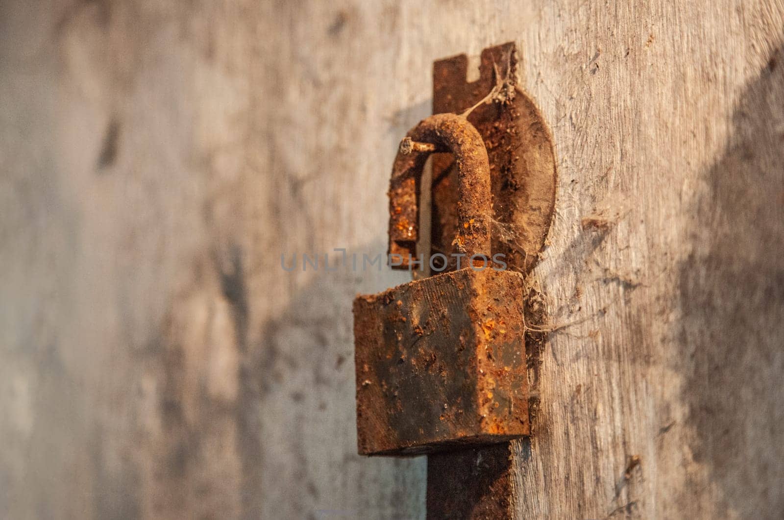 Old rusty lock close up
