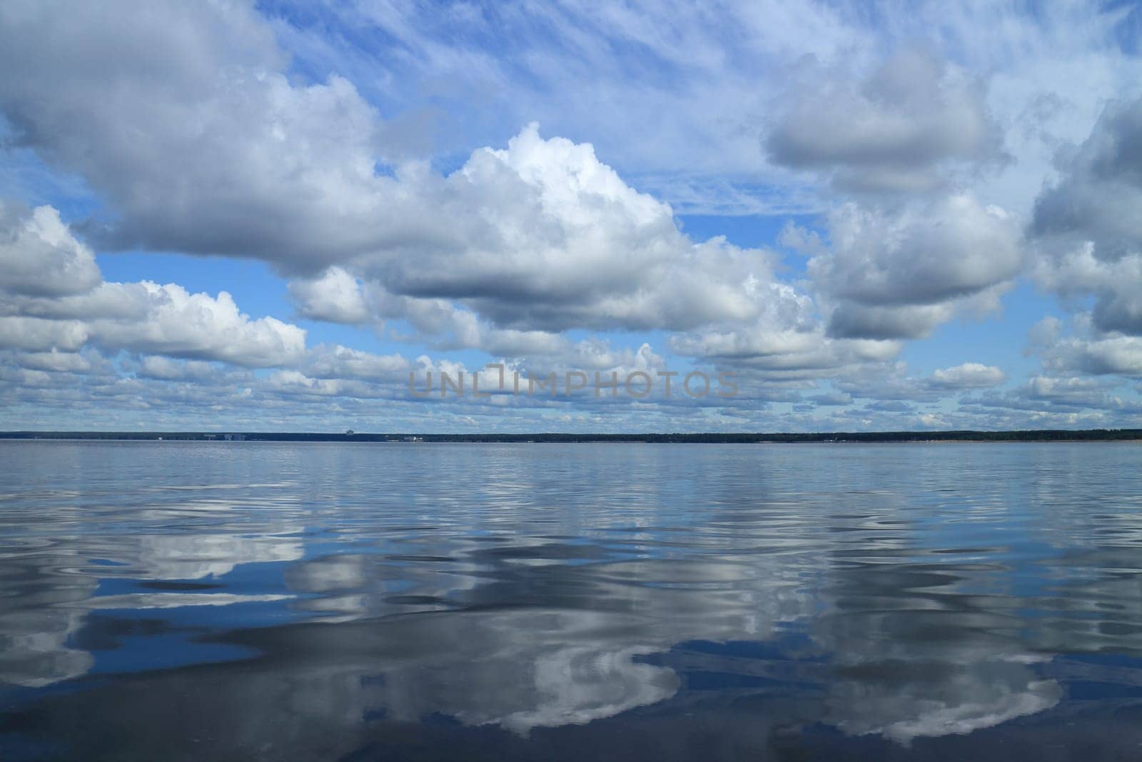 Beautiful seascape, clouds reflected in the sea , View from a boat