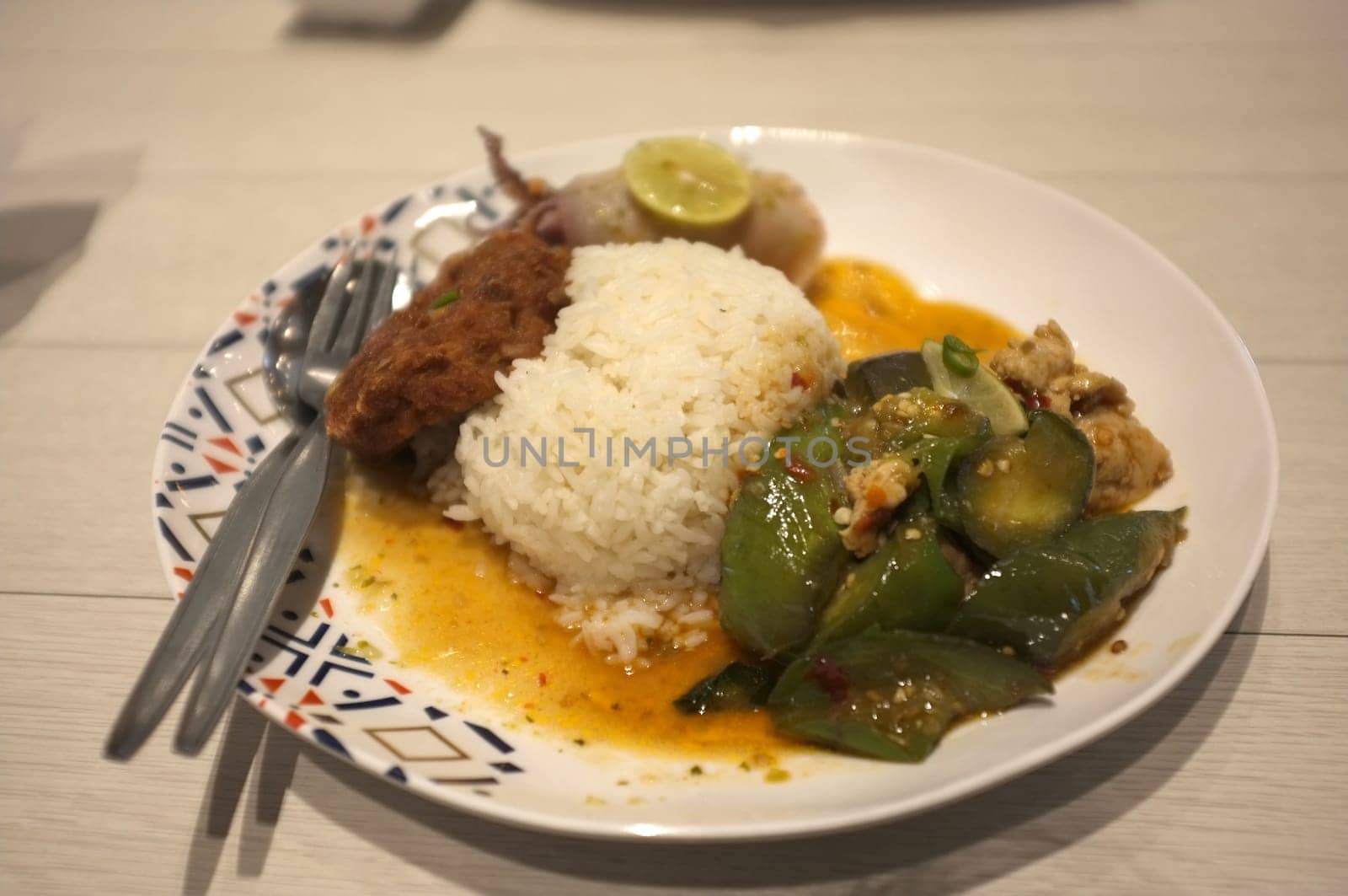 Rice and Spicy stir fry eggplant and minced pork in Rice and Curry Shop at Central Village outlet near Suvarnabhumi , Thailand