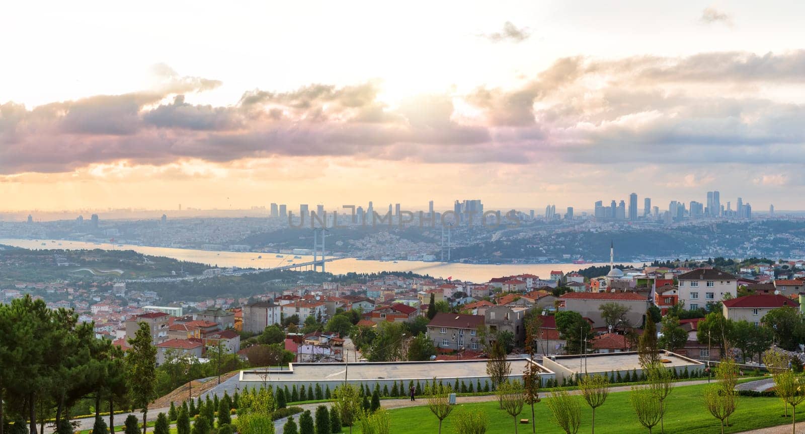 View on the Bosphorus Bridge and Istanbul skyscrappers from Camlica Hill, Turkey.