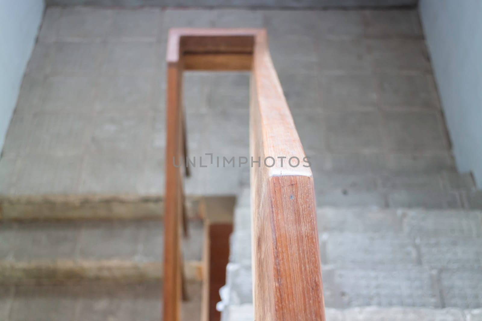 Staircase inside the house with cement floor, stock photo