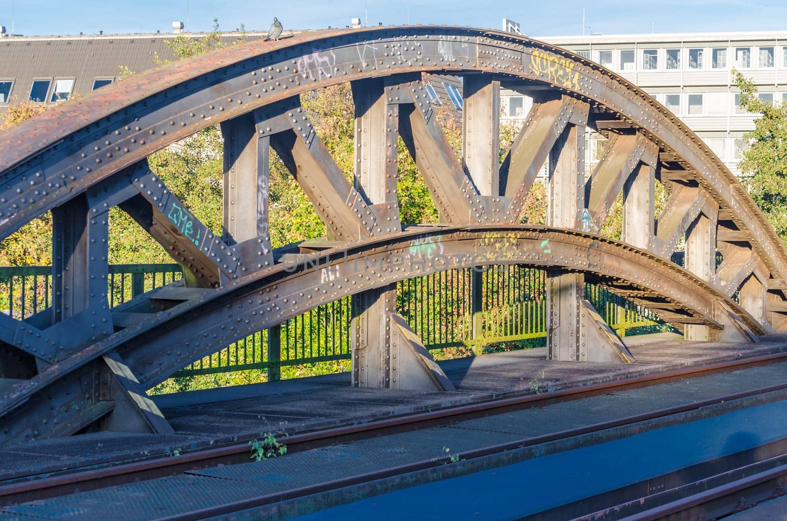 Riveted old bridge arch of an old railway bridge.