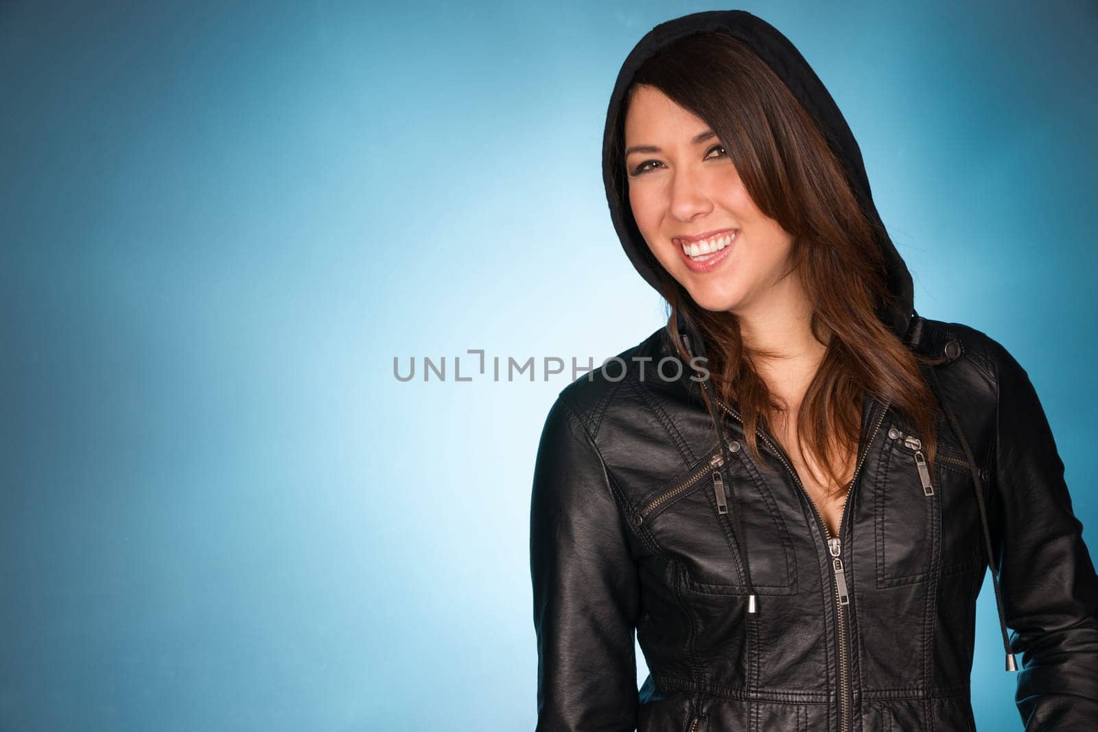 Cute woman in her twenties smiling at the camera