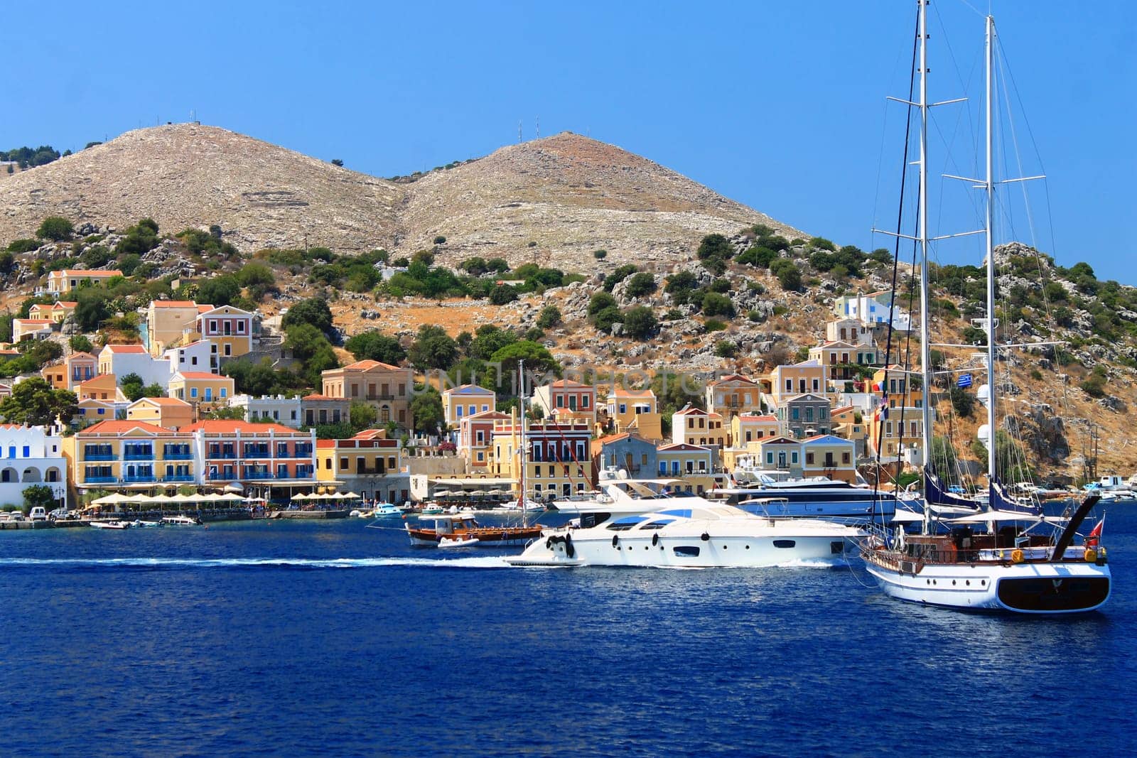Boats and houses of Simi island in Greece