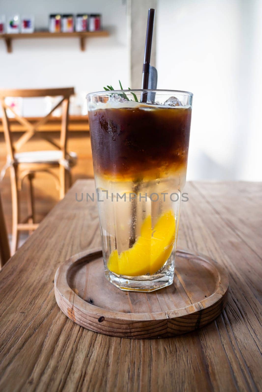 Signature drink of iced peach black coffee, stock photo