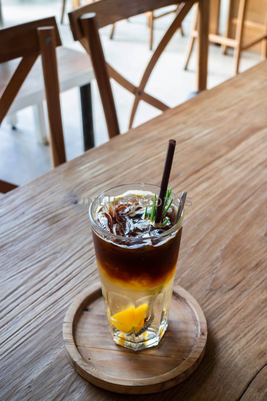Signature drink of iced peach black coffee, stock photo