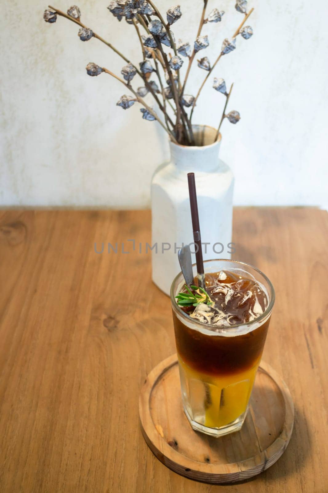 Signature drink of iced peach black coffee, stock photo