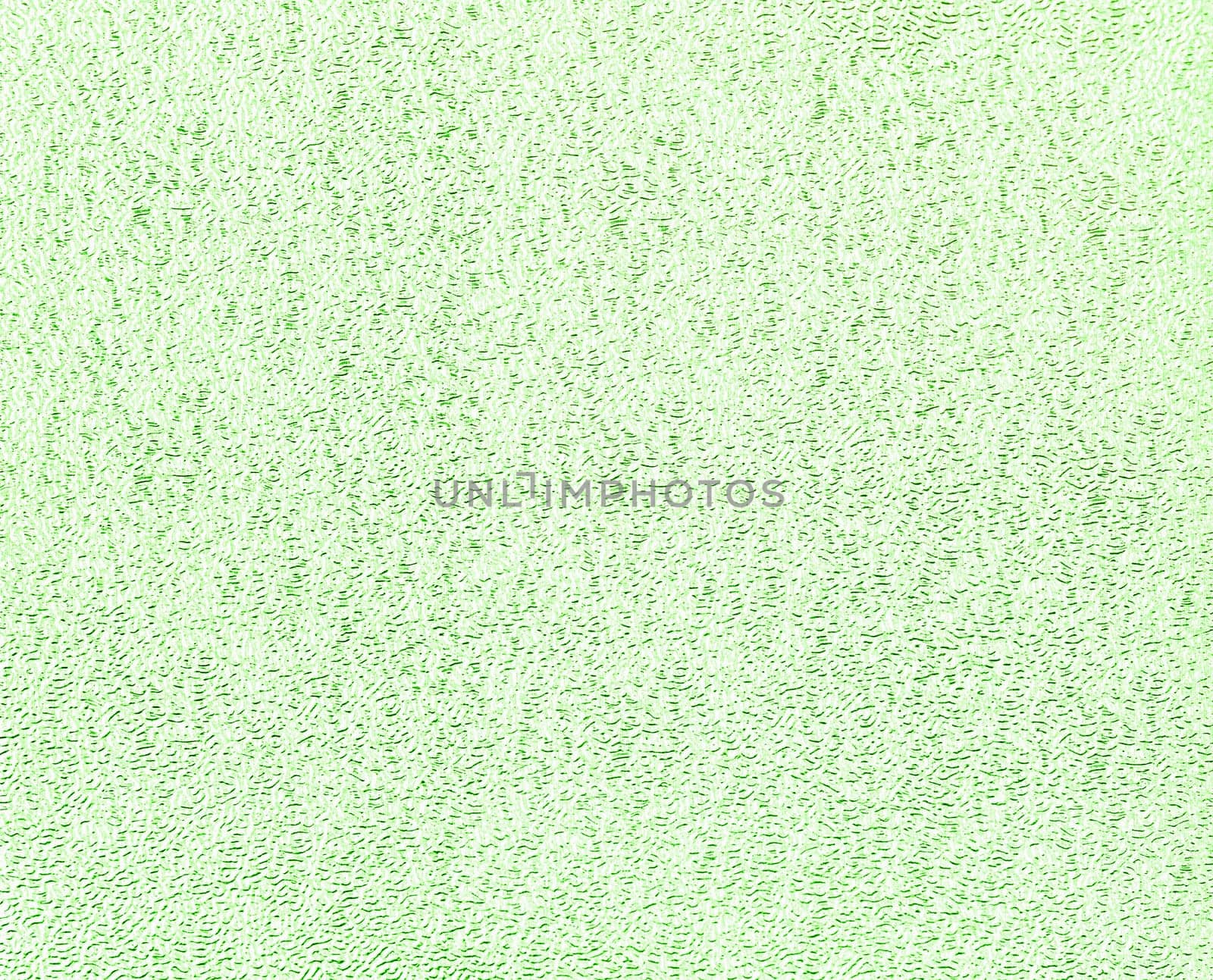 Green glitter foil textured background closeup