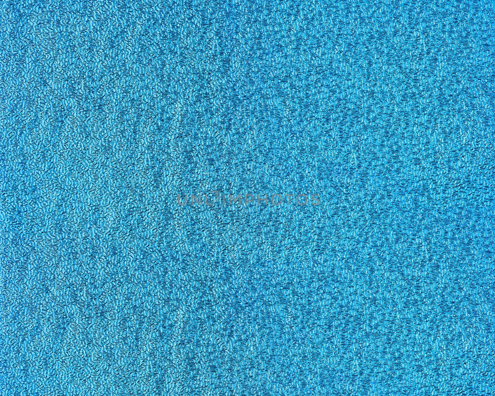 Blue glitter foil textured background closeup
