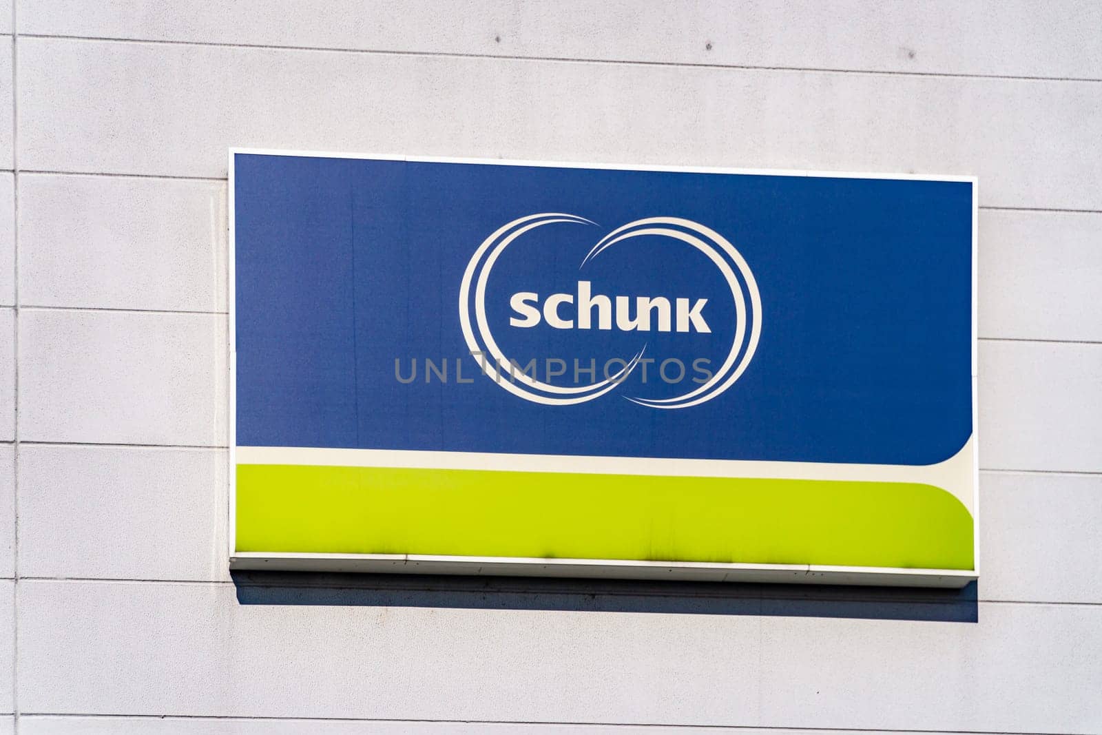 GIESSEN HEUCHELHEIM, GERMANY - August, 2019: Schunk logo sign on the wall