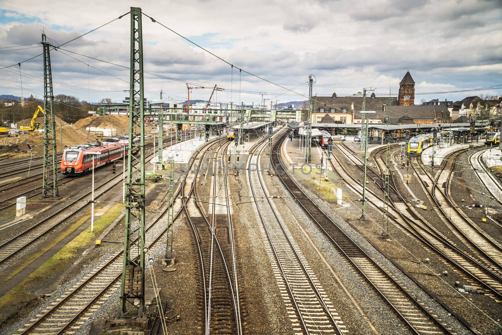 GIESSEN, GERMANY - APRIL 05, 2018: View of the railway station with a lot of Tracks and Train.