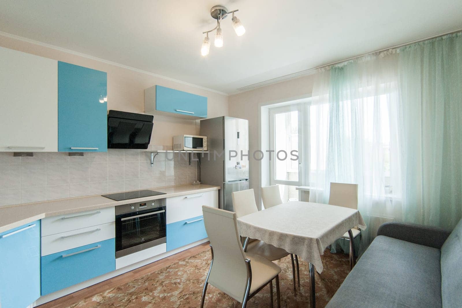 Russia, Moscow- June 05, 2019: interior room apartment. standard repair decoration in hostel. kitchen and dining room
