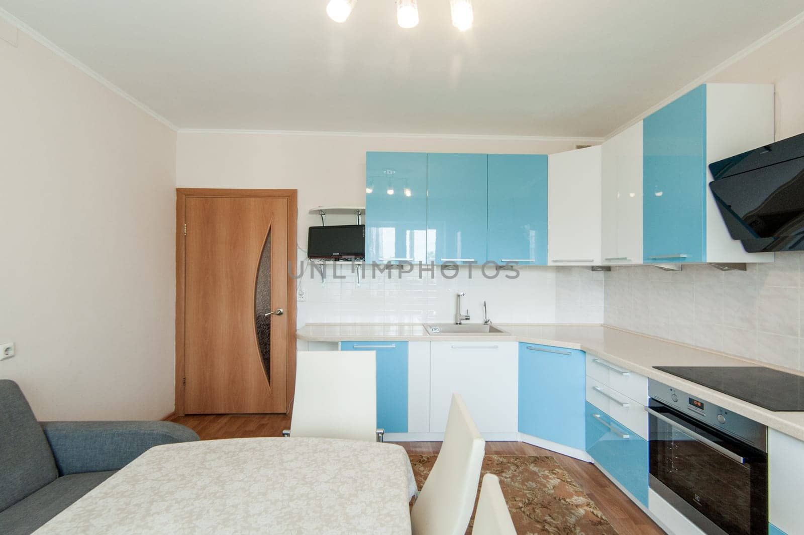 Russia, Moscow- June 05, 2019: interior room apartment. standard repair decoration in hostel. kitchen and dining room