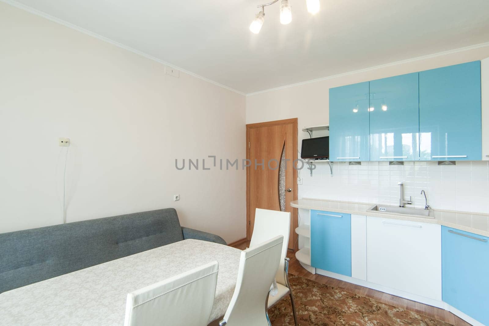 Russia, Moscow- June 05, 2019: interior room apartment. standard repair decoration in hostel. kitchen and dining room