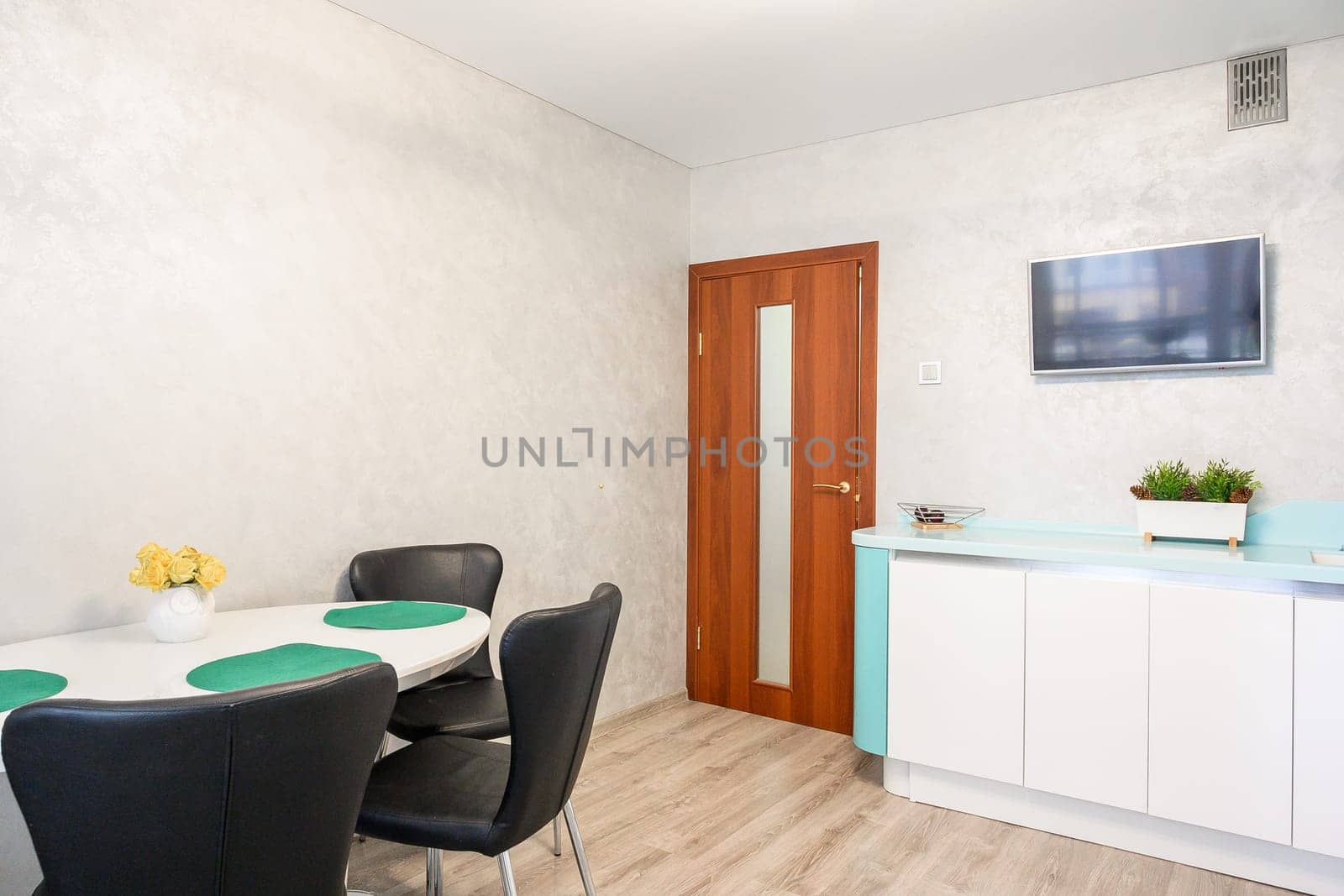Russia, Moscow- June 10, 2019: interior room apartment. standard repair decoration in hostel. kitchen and dining room