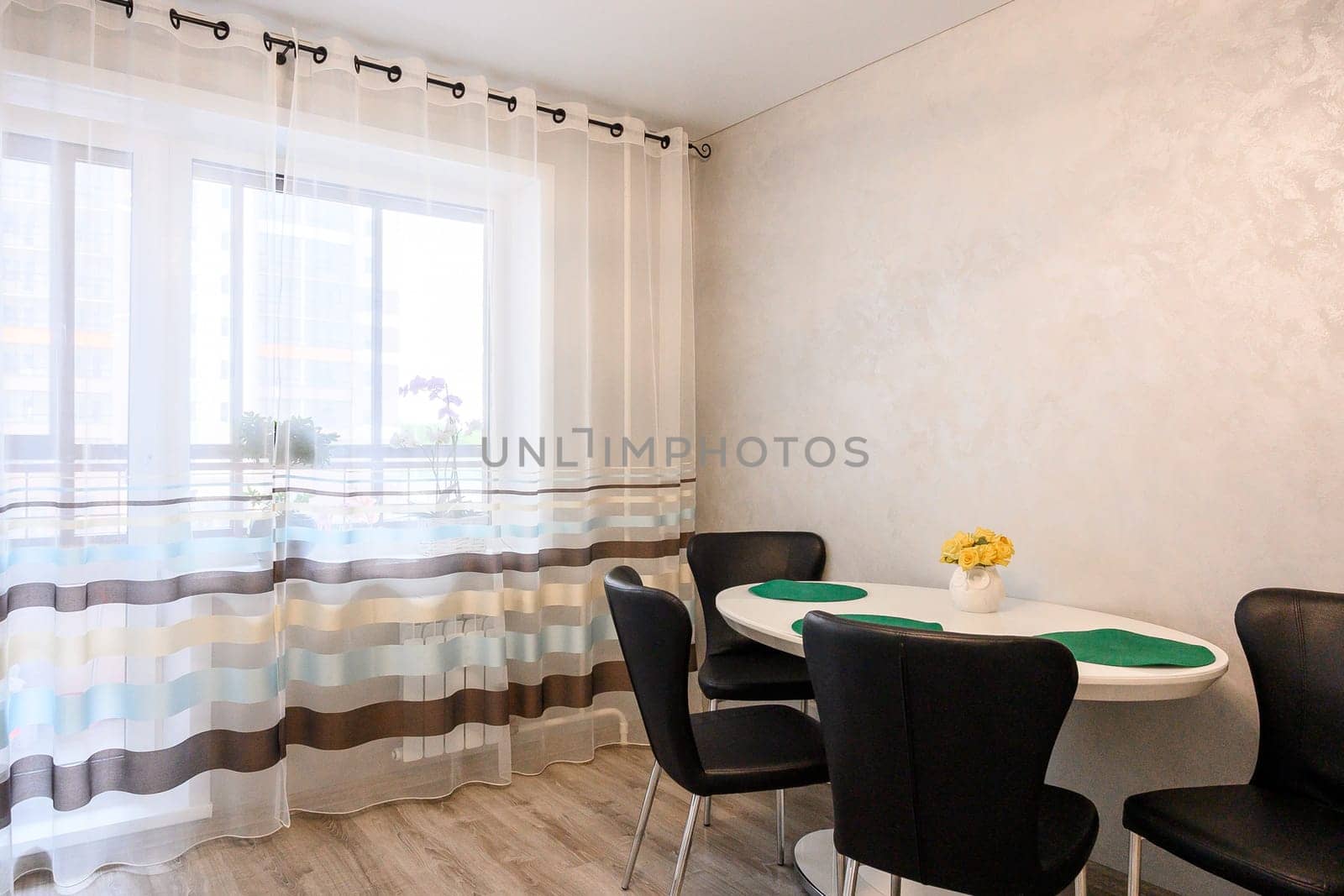 Russia, Moscow- June 10, 2019: interior room apartment. standard repair decoration in hostel. kitchen and dining room