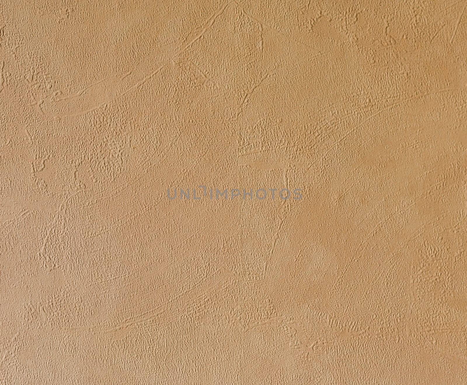 Bright beige rough plastered house wall frame as a background