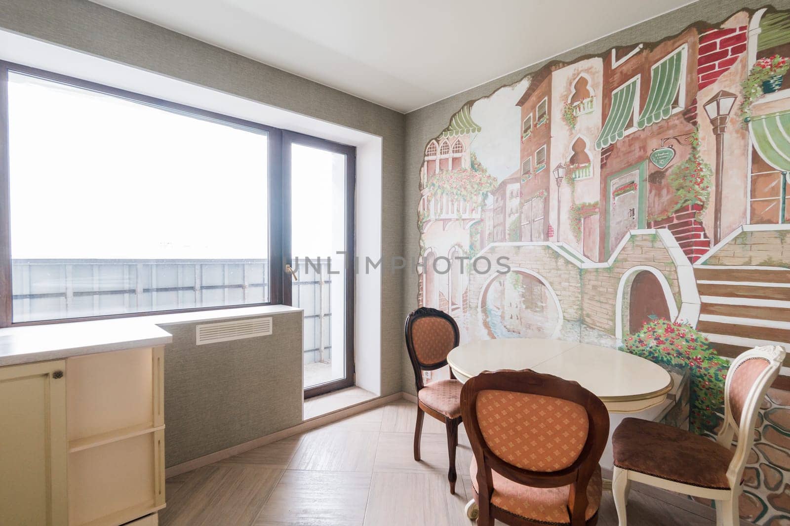 Russia, Moscow- June 11, 2019: interior room apartment. standard repair decoration in hostel. modern kitchen, dining area