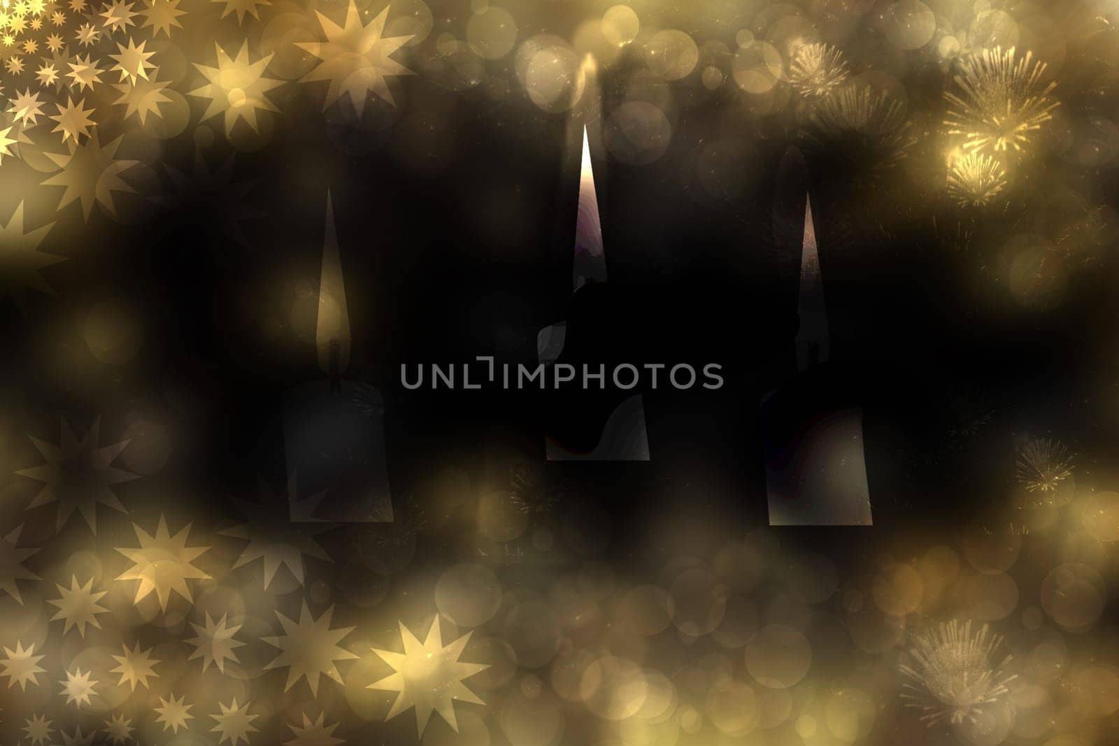 A festive abstract Happy New Year or Christmas texture background with colorful gold yellow blurred bokeh lights and stars. Dark space with candles lights for design. Card concept or sale advertising.