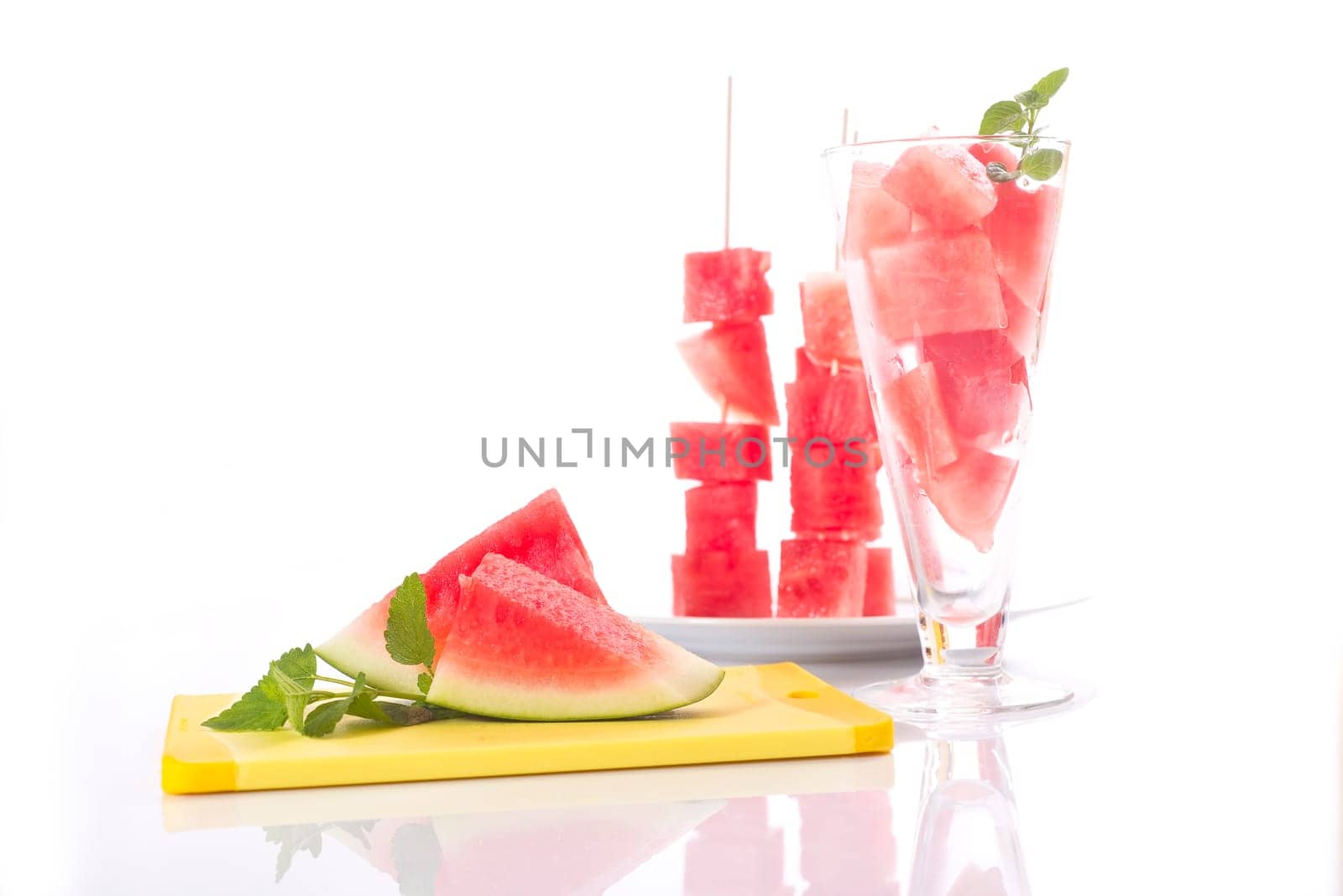 diced melon, watermelon on bright background