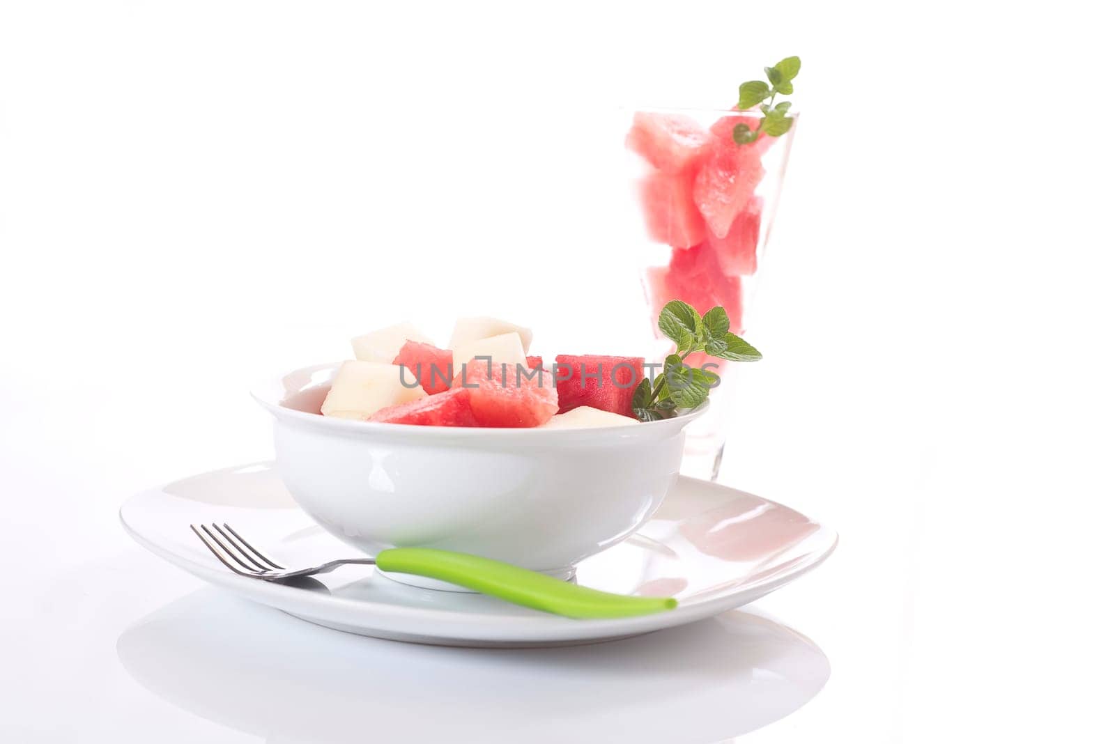 diced melon, watermelon on bright background