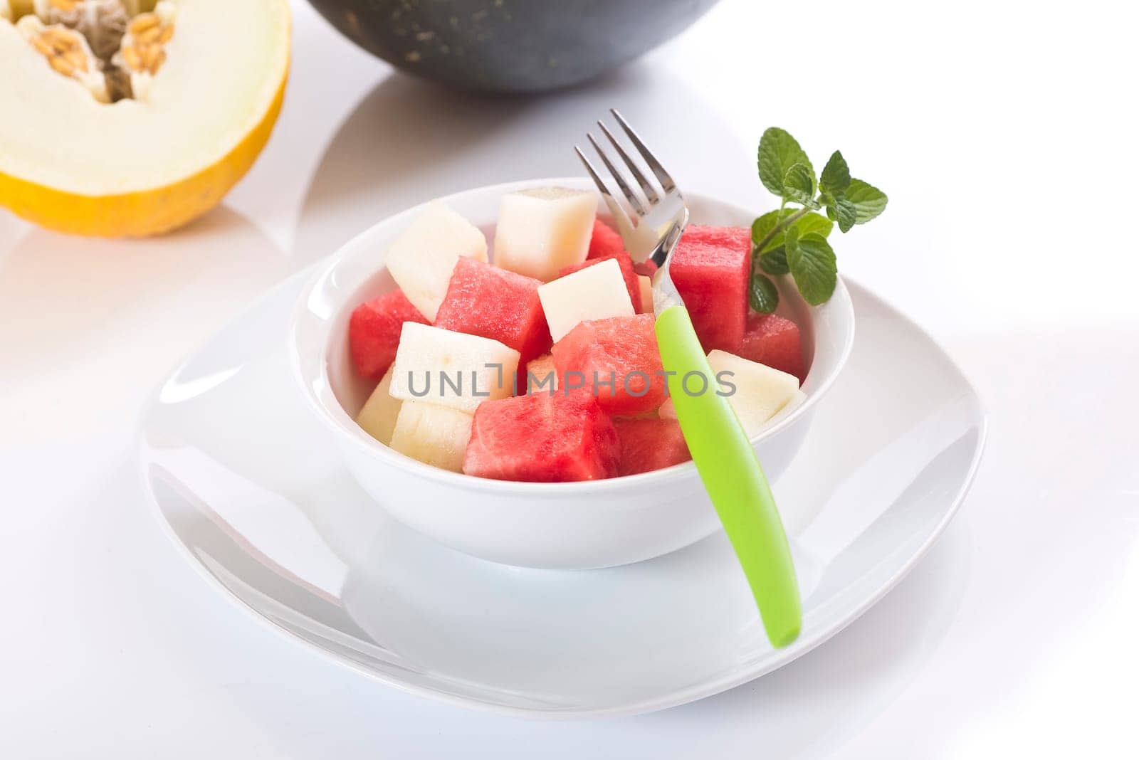 diced melon, watermelon on bright background