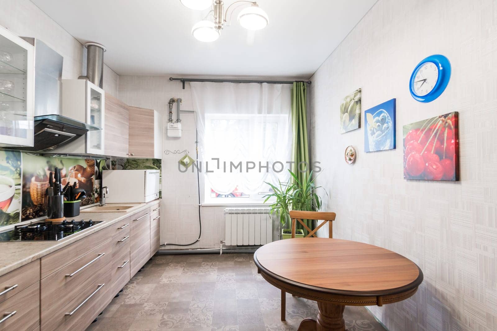 Russia, Moscow- June 11, 2019: interior room apartment. standard repair decoration in hostel. kitchen and dining room