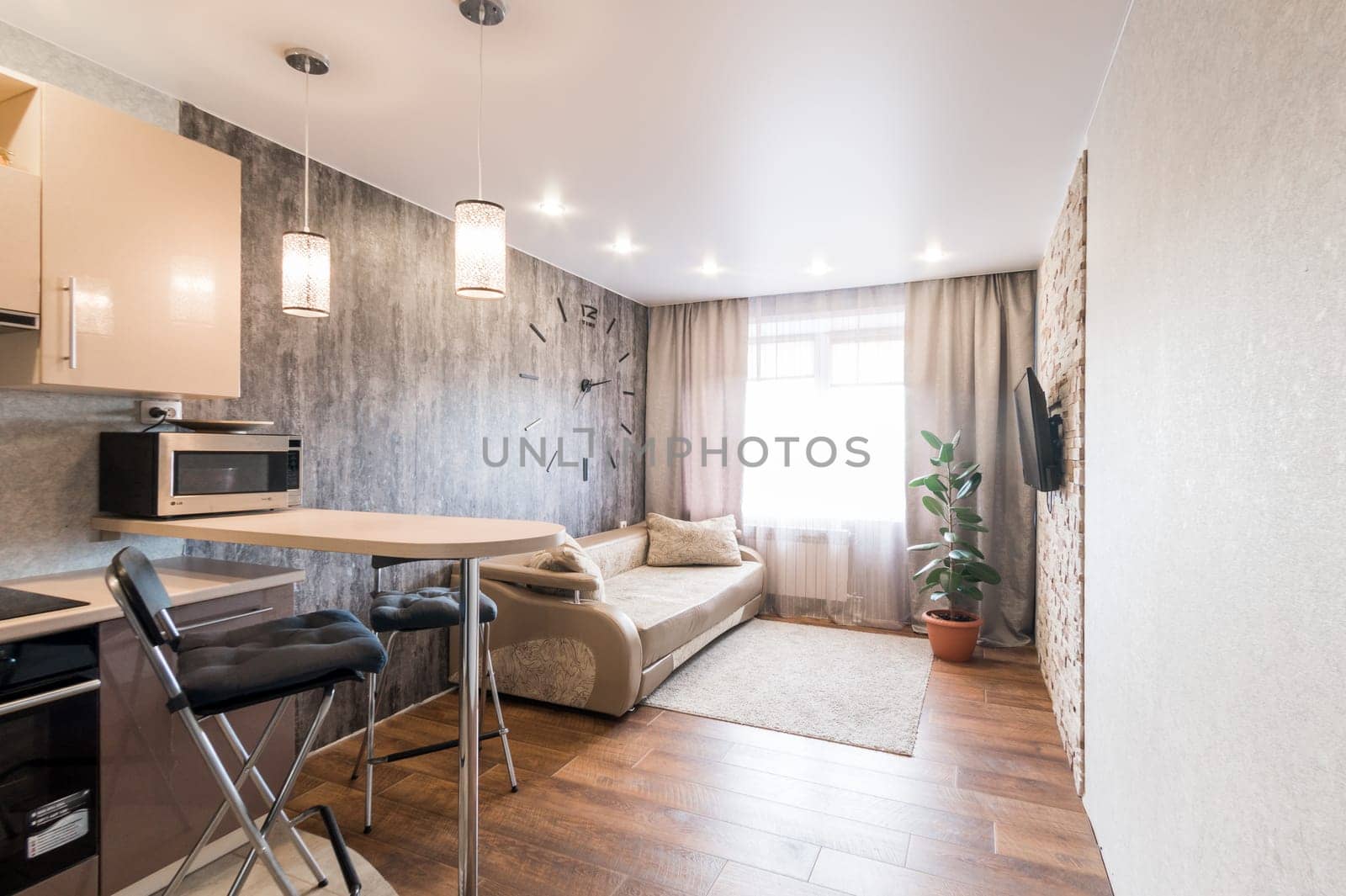 Russia, Moscow- June 11, 2019: interior room apartment. standard repair decoration in hostel. kitchen and dining room