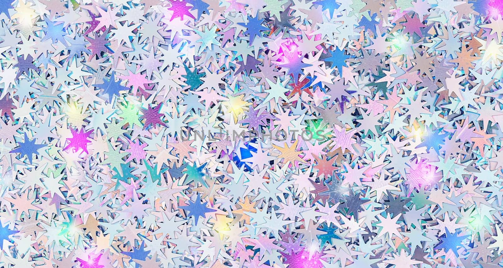 Real shiny star of Bethlehem shaped sparkles textured background