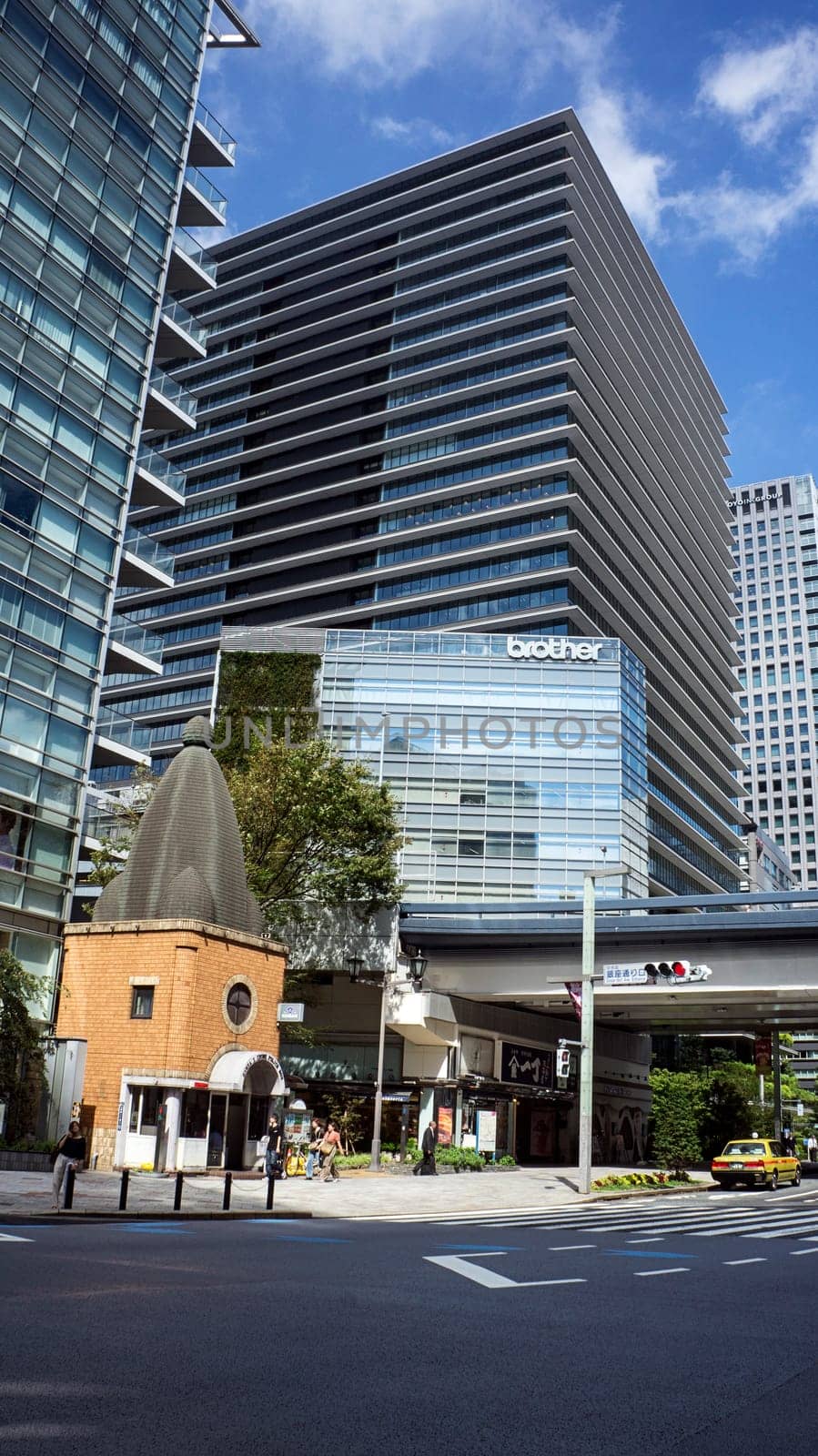 ginza famous district tall building street view bridge