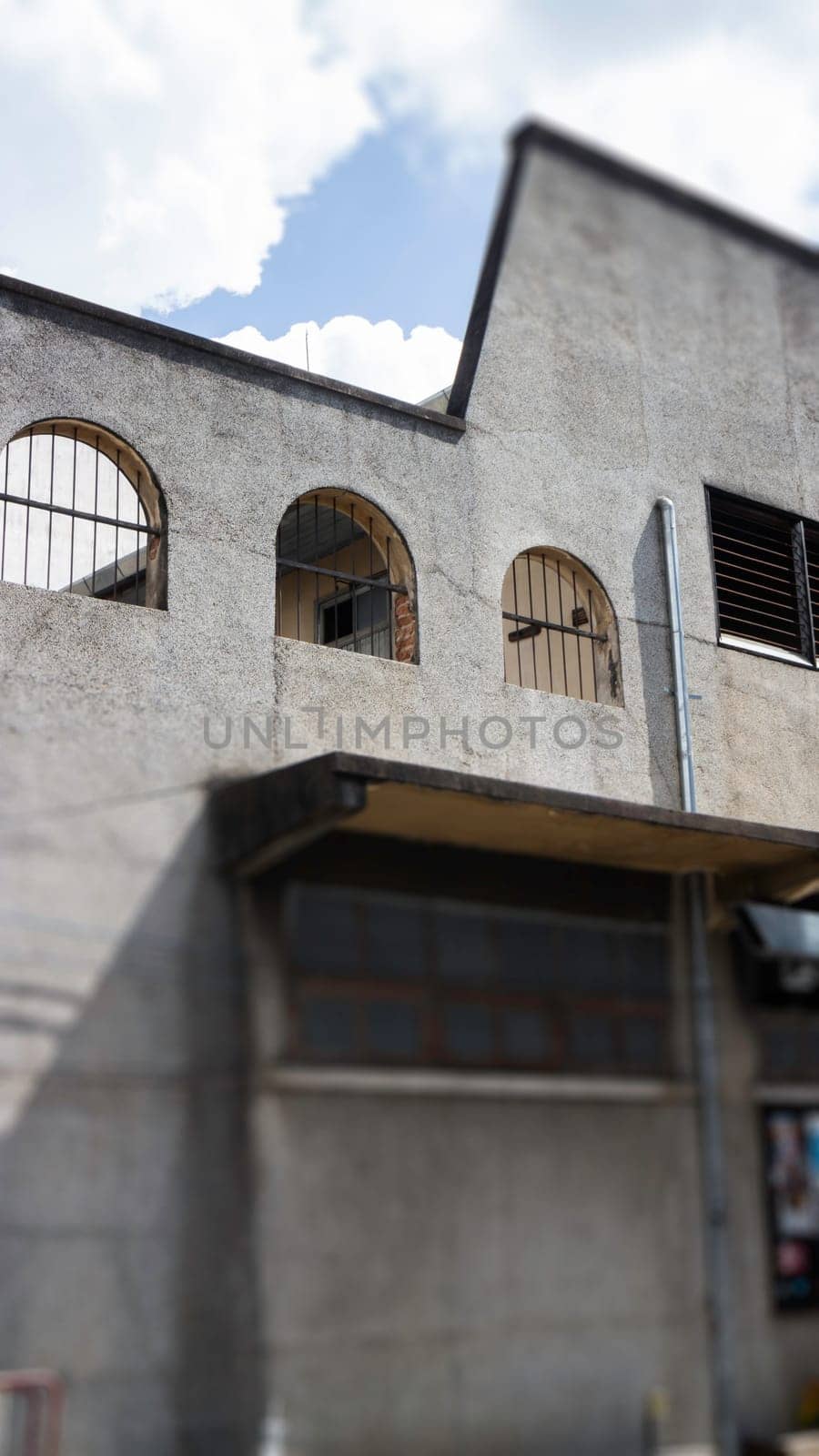 Old concrete grunge wall of building, stock photo