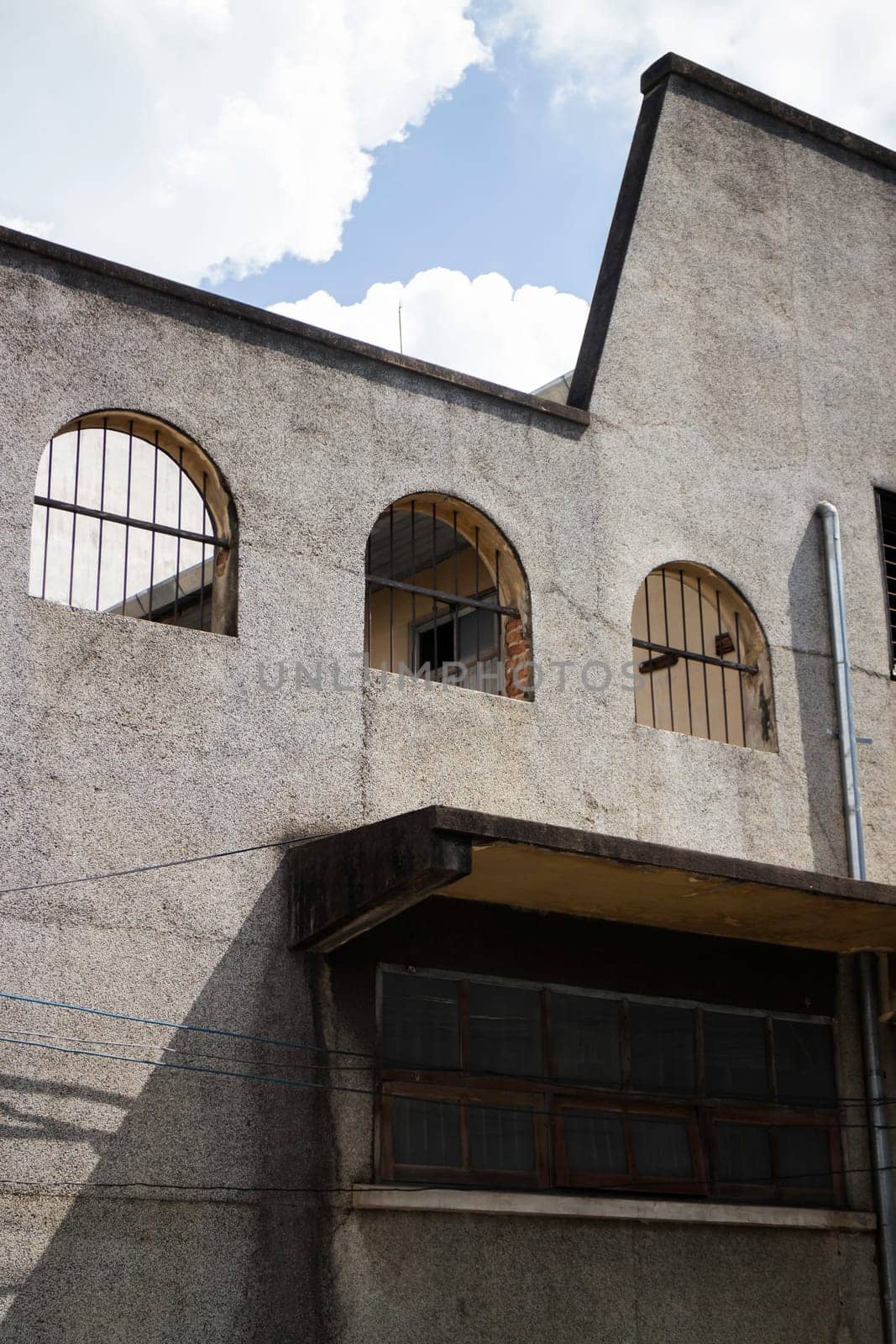 Old concrete grunge wall of building, stock photo