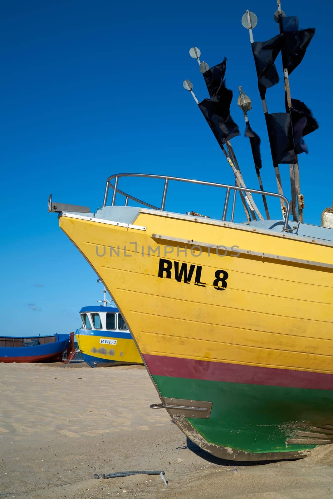 Fishing boat on the beach of the Baltic Sea at Rewal in Poland