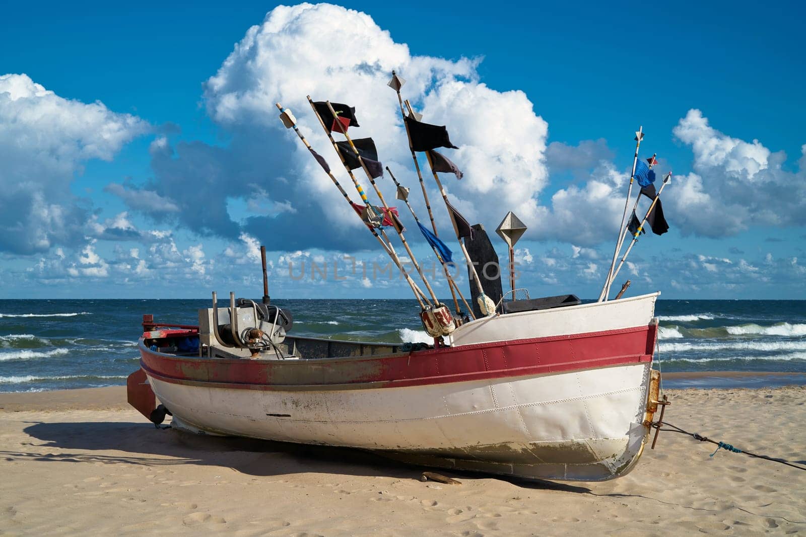 Fishing boats on the beach of the Polish Baltic coast in Rewal
