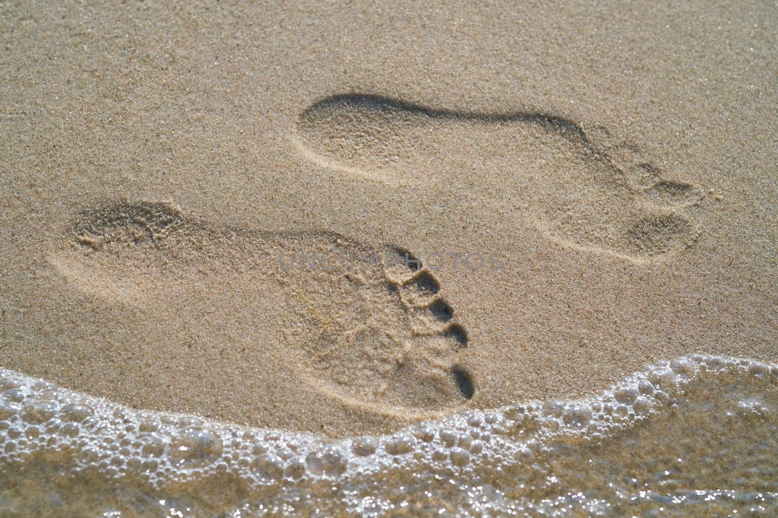 Footprint on the beach of the Baltic Sea at Rewal in Poland