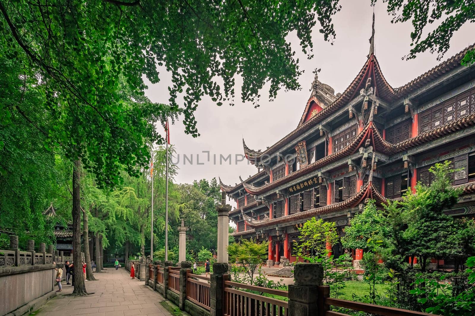 Chengdu, China -  July 2019 : Courtyard and walking path in front of an impressive temple in Wenshu Monastery