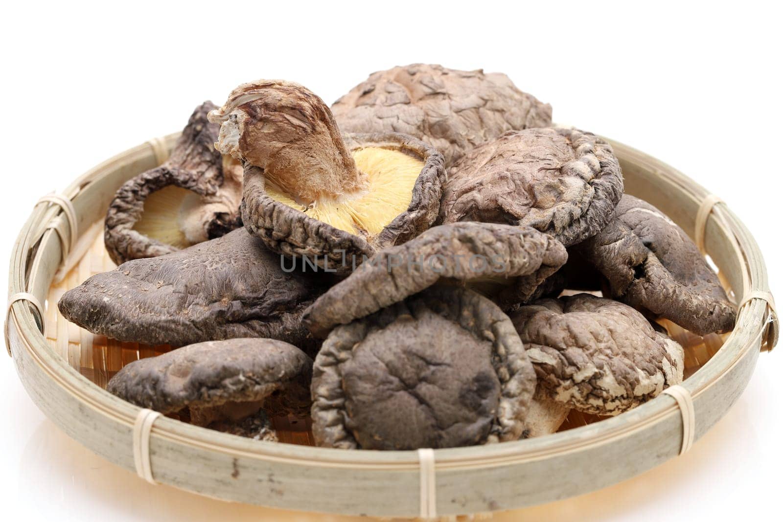 Japanese dried shiitake mushrooms in a bamboo basket