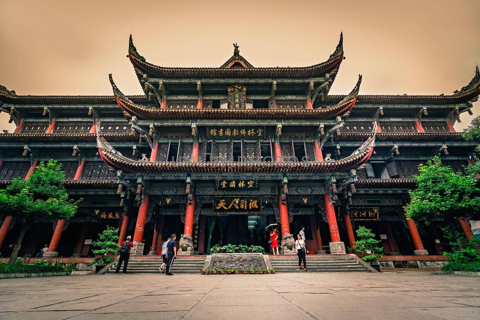 Chengdu, China -  July 2019 : Gates to the courtyard in front of an impressive temple in Wenshu Monastery